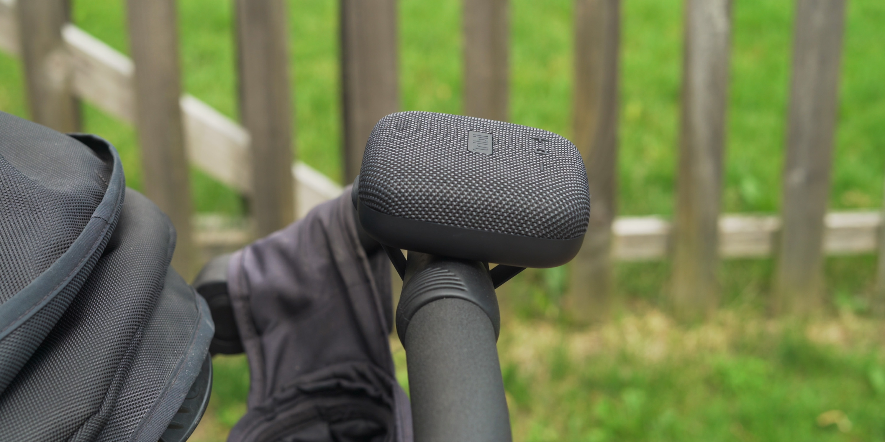 Tribit StormBox Micro attached to stroller handlebar