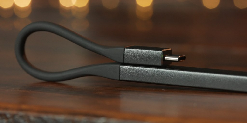 The THX Onyx can clip to itself to help manage cables when on the go.