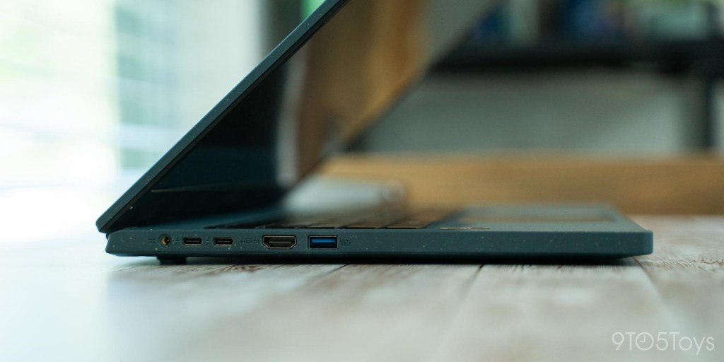 a close up of a laptop computer sitting on top of a table